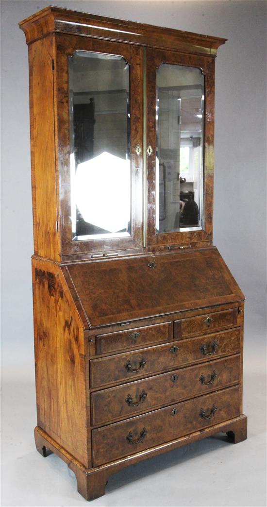 An early 18th century burr walnut bureau bookcase, W.3ft 3in. D.1ft 10in. H.7ft